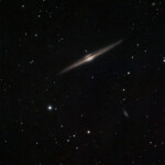 NGC 4565 (also known as the Needle Galaxy or Caldwell 38) is an edge-on spiral galaxy about 30 to 50 million light-years away in the constellation Coma Berenices. It lies close to the North Galactic Pole and has a visual magnitude of approximately 10.
NGC 4565 is a giant spiral galaxy more luminous than the Andromeda Galaxy. Much speculation exists in literature as to the nature of the central bulge. In the absence of clear-cut dynamical data on the motions of stars in the bulge, the photometric data alone cannot adjudge among various options put forth. However, its exponential shape suggested that it is a barred spiral galaxy. Studies with the help of the Spitzer Space Telescope not only confirmed the presence of a central bar but also showed a pseudobulge within it as well as an inner ring.
NGC 4565 has at least two satellite galaxies, one of which is interacting with it. It has a population of roughly 240 globular clusters, more than the Milky Way.
NGC 4565 is one of the brightest member galaxies of the Coma I Group.
Photographed with the MN190 telescope, Atik 360EX CCD camera, and 15*2 min RGB each + 25*2min lum from Stuvsta in March 2022. NGC 4565 (C38), Needle galaxy