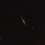 NGC 4565 (also known as the Needle Galaxy or Caldwell 38) is an edge-on spiral galaxy about 30 to 50 million light-years away in the constellation Coma Berenices. It lies close to the North Galactic Pole and has a visual magnitude of approximately 10.
NGC 4565 is a giant spiral galaxy more luminous than the Andromeda Galaxy. Much speculation exists in literature as to the nature of the central bulge. In the absence of clear-cut dynamical data on the motions of stars in the bulge, the photometric data alone cannot adjudge among various options put forth. However, its exponential shape suggested that it is a barred spiral galaxy. Studies with the help of the Spitzer Space Telescope not only confirmed the presence of a central bar but also showed a pseudobulge within it as well as an inner ring.
NGC 4565 has at least two satellite galaxies, one of which is interacting with it. It has a population of roughly 240 globular clusters, more than the Milky Way.
NGC 4565 is one of the brightest member galaxies of the Coma I Group.
Photograped with the MN190 reflector and the ASI 2600MC camera in Stuvsta in March 2022. 26*3min exposure with IDAS LPS P3 filter. NGC 4565 (C38), Needle galaxy