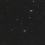 NGC 3613 is an elliptical galaxy in the constellation Ursa Major some 98 million light years away.
NGC 3619 is an unbarred lenticular galaxy located in the constellation Ursa Major some 87 million light years away.
NGC 3625 is a spiral galaxy in Ursa Major some 120 million light years away.
Photographed with RC8" reflector telescope and ASI 2600MC color camera in Åva, April 2023. Exposure was a total of 50min with IDAS HEUIB filter. NGC 3613, NGC 3619, and NGC 3625