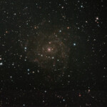 IC 342 is an intermediate spiral galaxy in the constellation Camelopardalis, located relatively close to the Milky Way. Despite its size and actual brightness, its location in dusty areas near the galactic equator makes it difficult to observe, leading to the nickname "The Hidden Galaxy". The dust makes it difficult to determine its precise distance; modern estimates range from about 7 Mly to about 11 Mly. It is one of the brightest in the IC 342/Maffei Group, one of the closest galaxy groups to the Local Group.
Photographed with RC8" reflector telescope and ASI 2600MC color camera in Stuvsta, December 2022. Rxposure was 43*3min with IDAS LPS D2 light pollution filter. IC 342